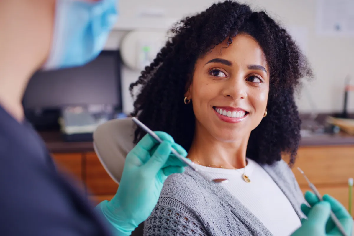 Restored natural smile after results following dental implants at Salathe Dental